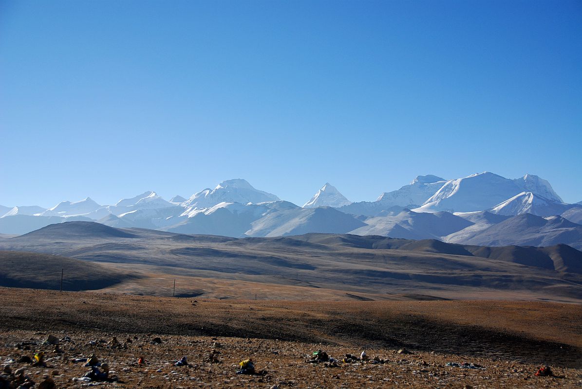 12 Lobuche Kang III E, Labuche Kang, Labuche Lang II and Colangma From Tong La The Labuche Kang massif is part of a beautiful mountain panorama viewed from the Tong La (also called Yarle Shang La). The Labuche Kang massif is part of the Himalayan range in Tibet, located North-West of Cho Oyu, and half-way between Cho Oyu and Shishapangma. This massif has several summits over 7000m, from left to right Lobuche Kang III East (7250m), Labuche Kang (7367m, also called Lobuche Kang I or Choksiam), the pyramid-shaped Labuche Kang II (7072m) and to the far right Colangma (6952m).